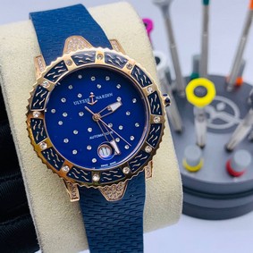 UN Diamond Blue Dial Case Gold Rubber Strap Replica